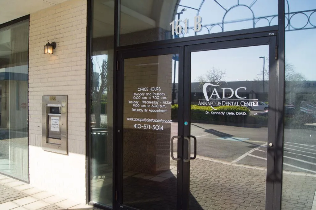 Front entrance door with the Annapolis Dental Center logo