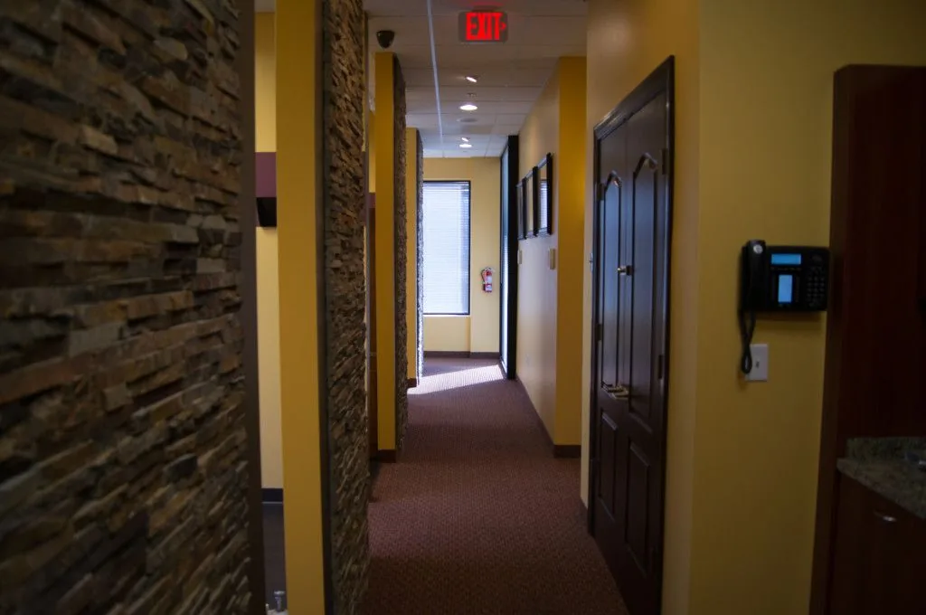 View down the treatment-room hallway