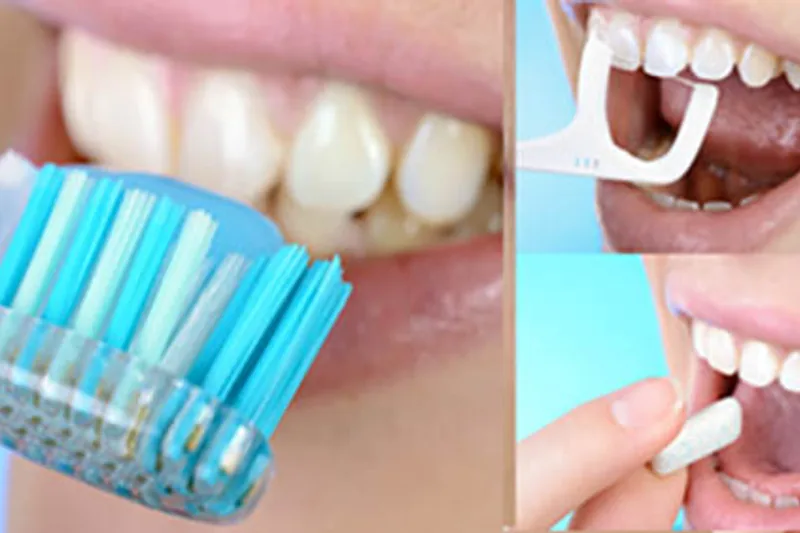 Hygienist reviewing brushing technique with a patient