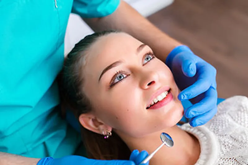 Patient receiving comfortable periodontal therapy